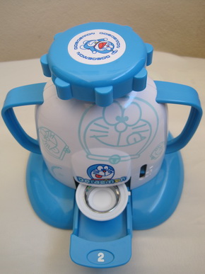 Doraemon เครื่องปั๊มเข็มกลัด by Bandai