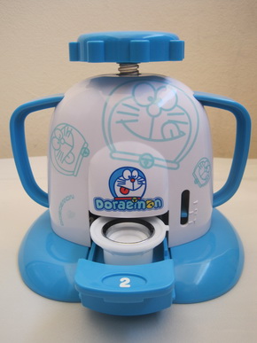 Doraemon เครื่องปั๊มเข็มกลัด by Bandai